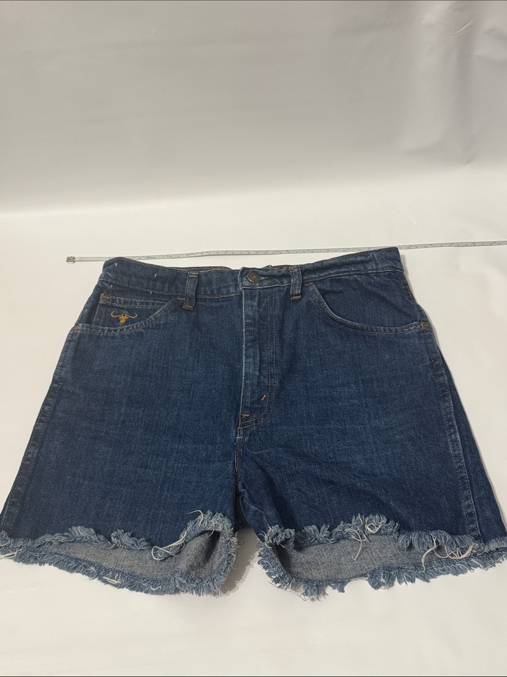 Vintage Cowden "Bull" denim cut-off shorts, a heritage western wear 80s.